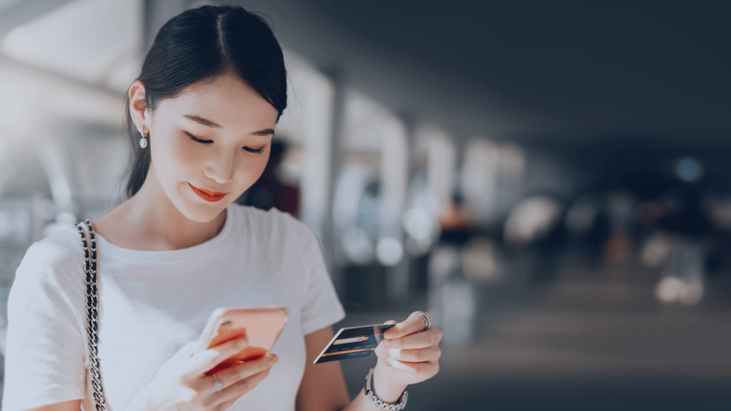 An Arizzon Capital client checking her credit card before making a billing payment using our easy Stripe payment service.